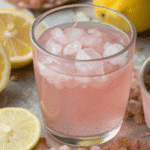 Pink salt weight-loss water with lemon and salt crystals
